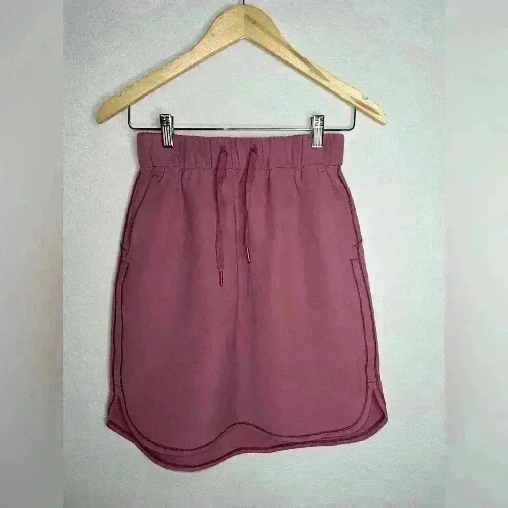 Lululemon On The Fly Skirt
Woven Misty Merlot  Rose Pink Size 4 - Picture 3 of 9